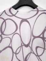 ست بلوز و دامن‌شلواری پلیسه LISSE طرح آبستره - تصویر 8